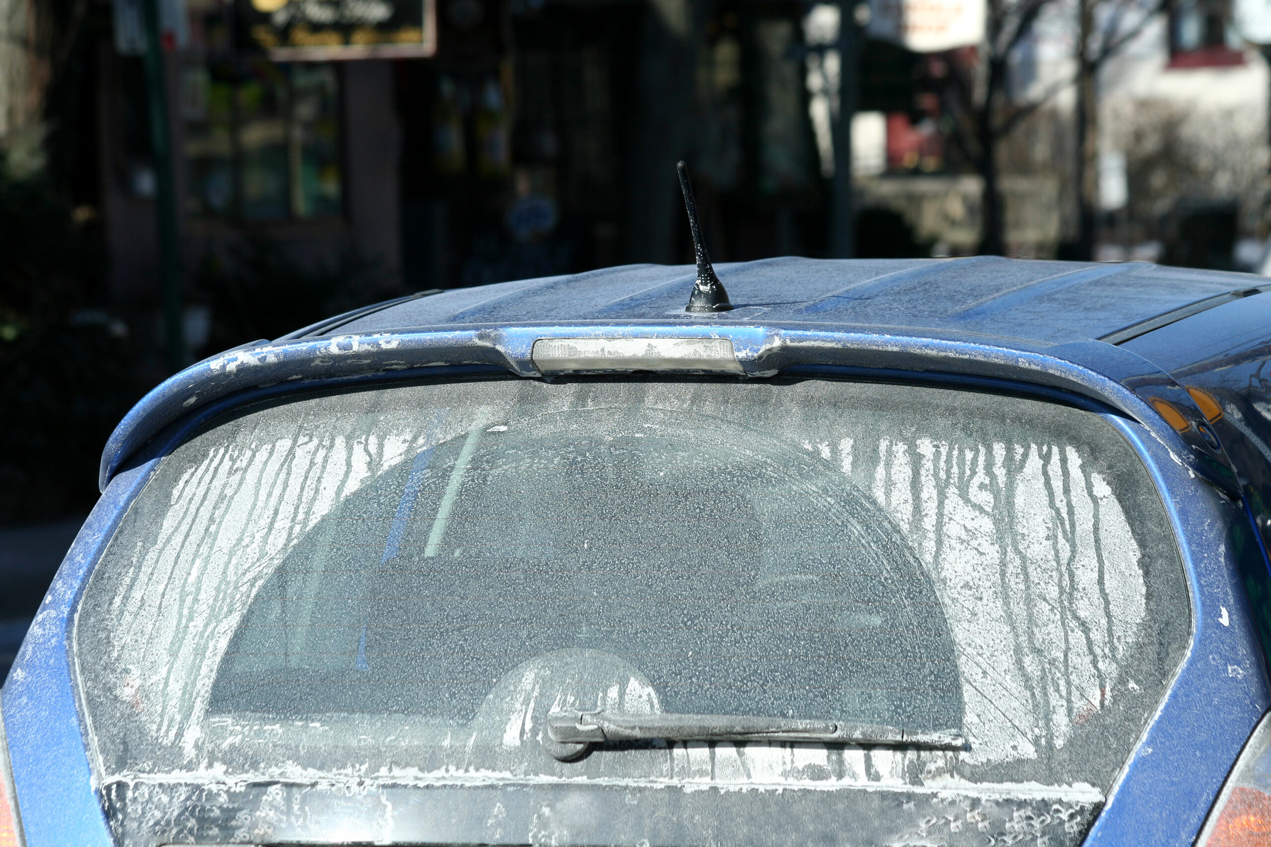 Salt build-up on the back of a car.